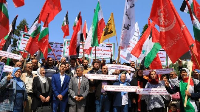 وقفة جماهيرية وسط غزة تنديداً بالعدوان الثلاثي علي دمشق